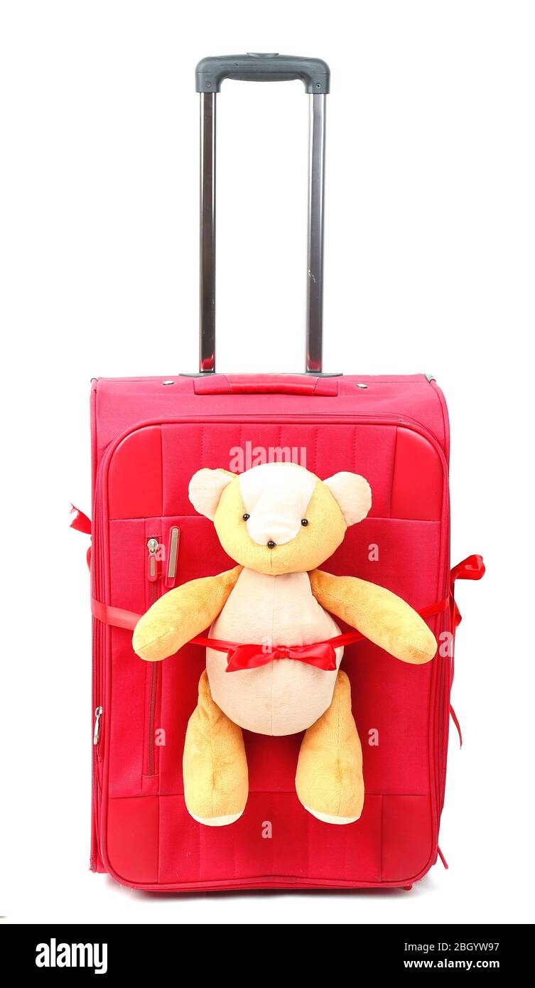 Red suitcase with toy teddy bear isolated on white Stock Photo Alamy