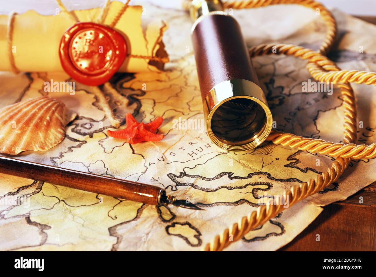 Still Life Map Marine still life with world map on wooden table background Stock Photo ...