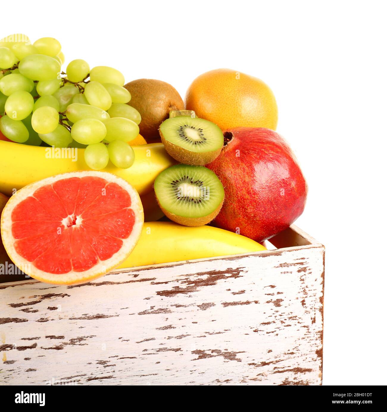 Assortment of fruits in box isolated on white Stock Photo - Alamy