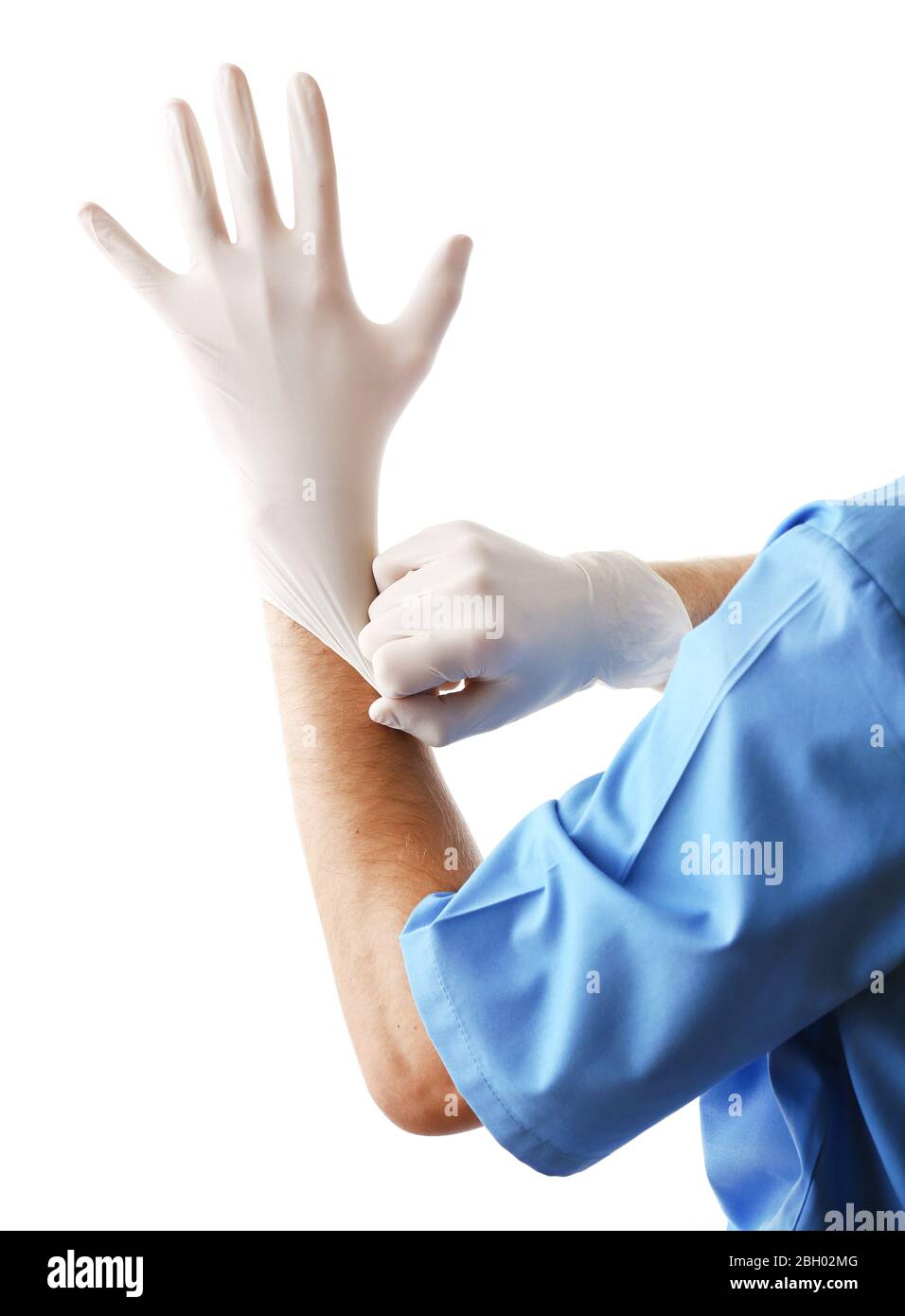 Doctor putting on sterile gloves isolated on white Stock Photo Alamy
