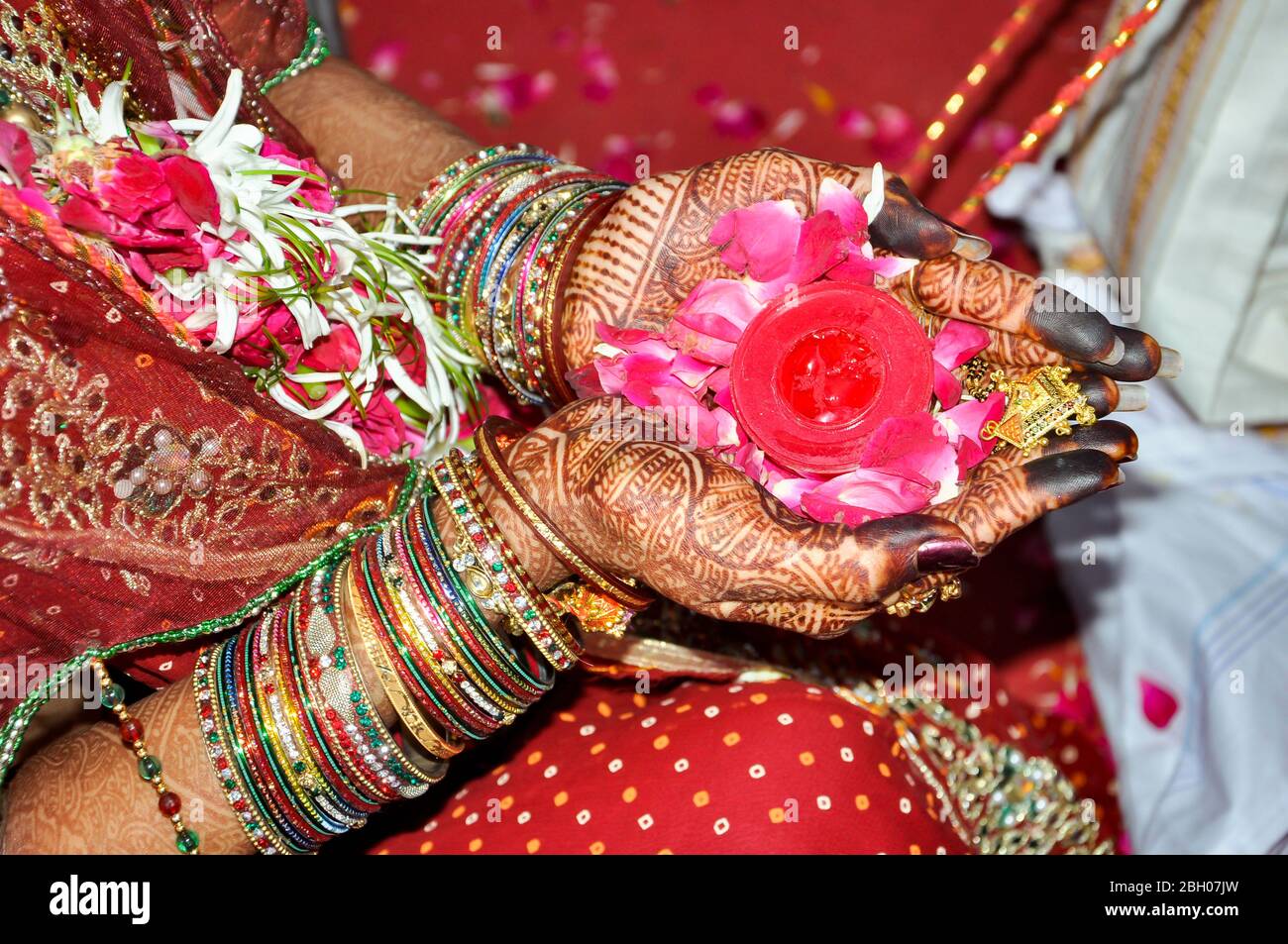 Indian wedding rituals with flower on hands, Indian marriage traditions Stock Photo