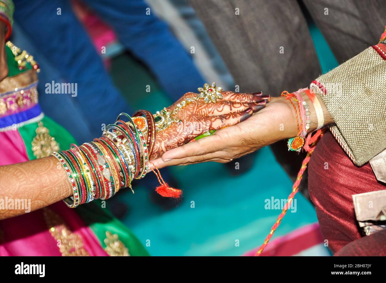 Indian couple's hand in hand in a wedding, Indian marriage traditions Stock Photo