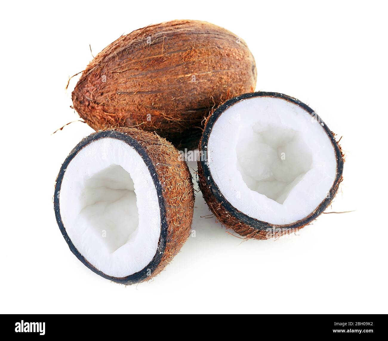 Coconut cut in half isolated on white background Stock Photo