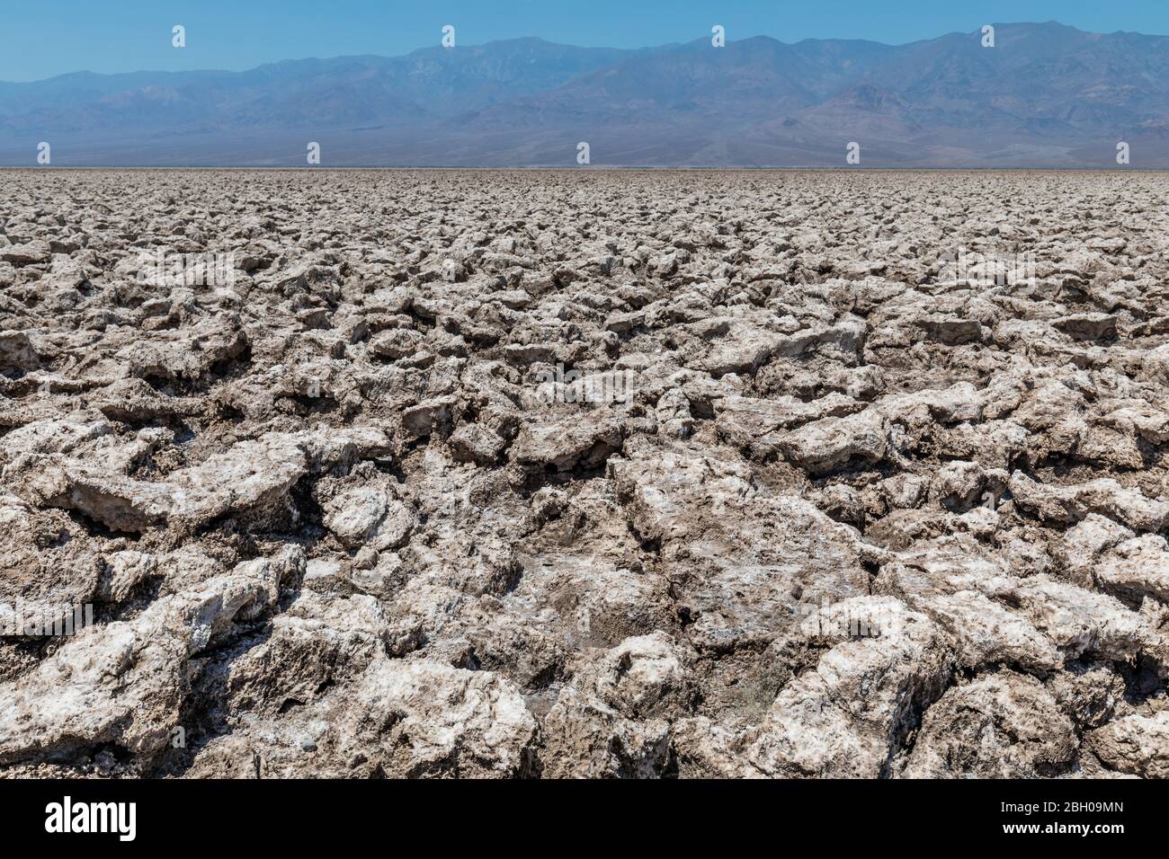 A vast expanse of dried salt called 'The devil's golf course' in the Death Valley, California Stock Photo