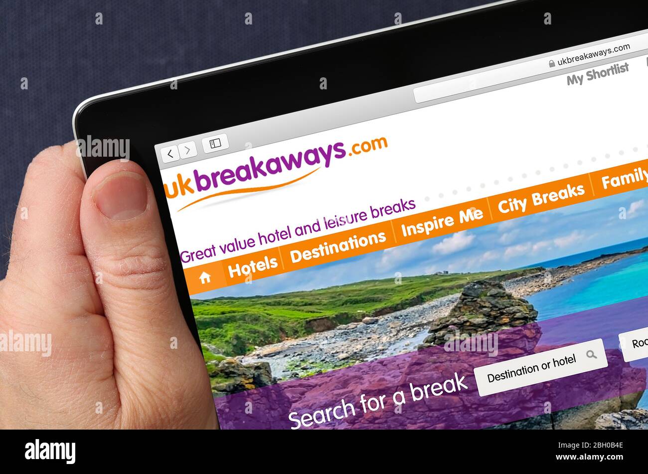 UK Breakaways holidays booking website viewed on an iPad Stock Photo