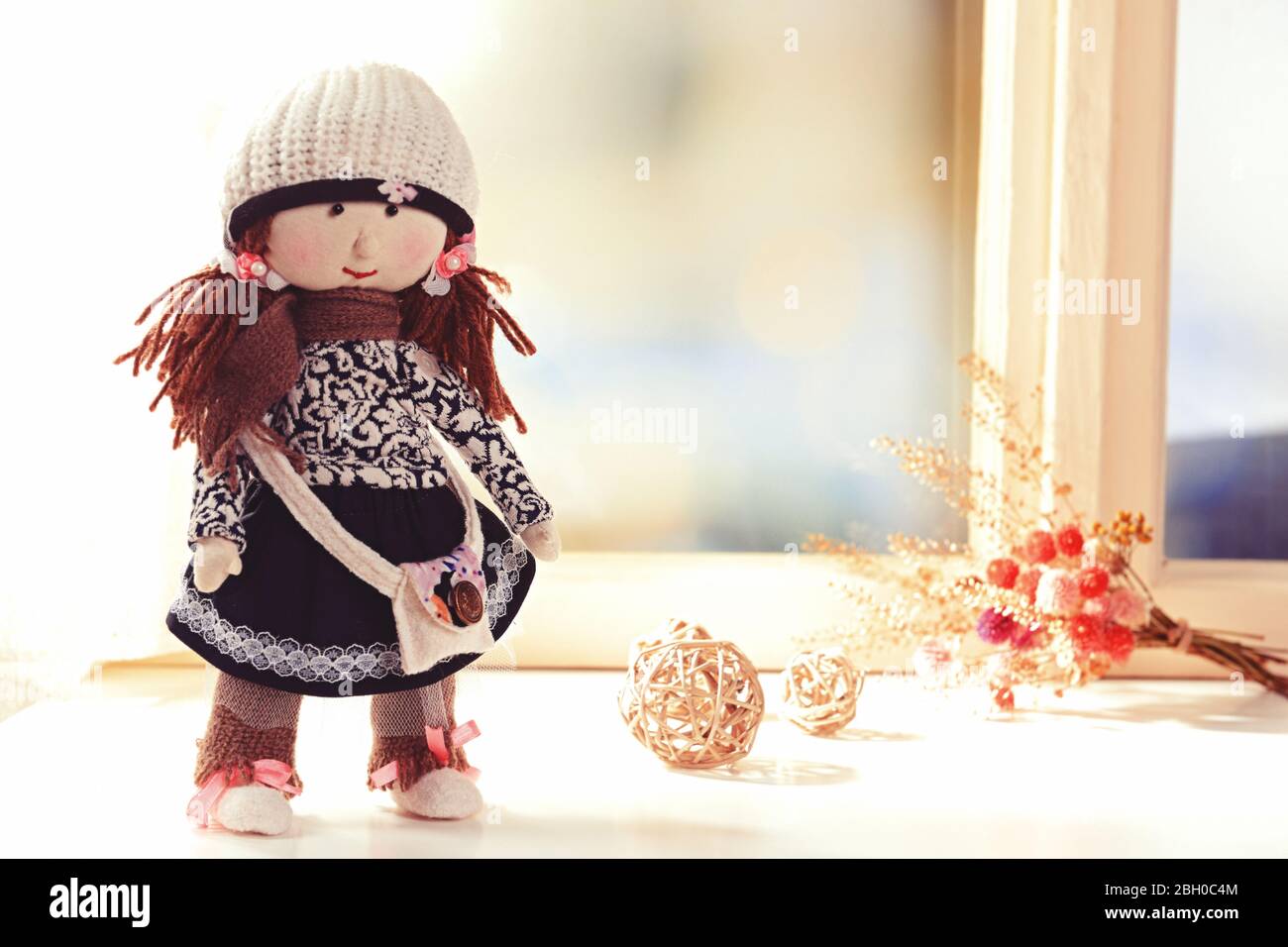 Handmade doll near window closeup Stock Photo Alamy