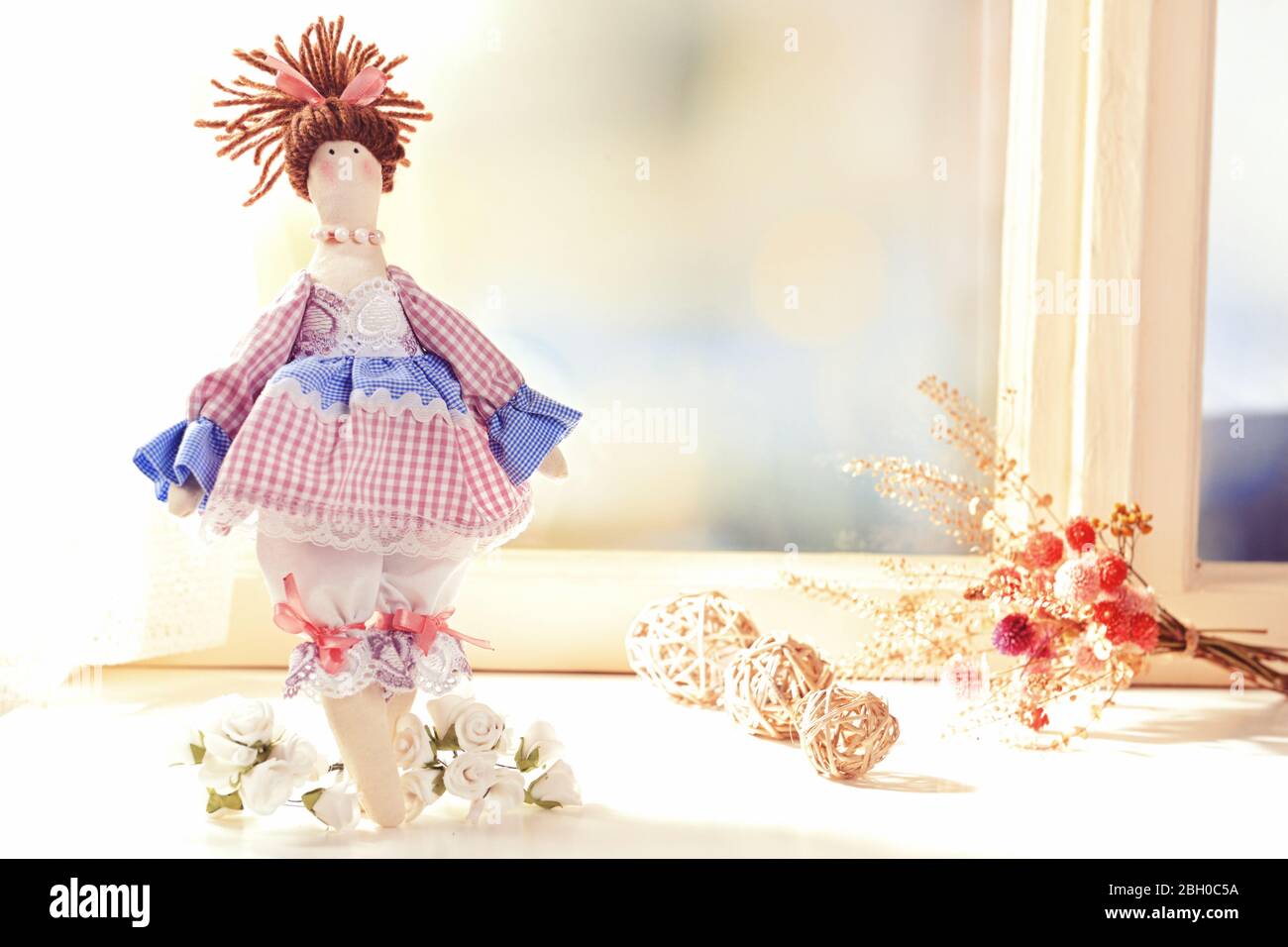 Handmade doll near window closeup Stock Photo Alamy