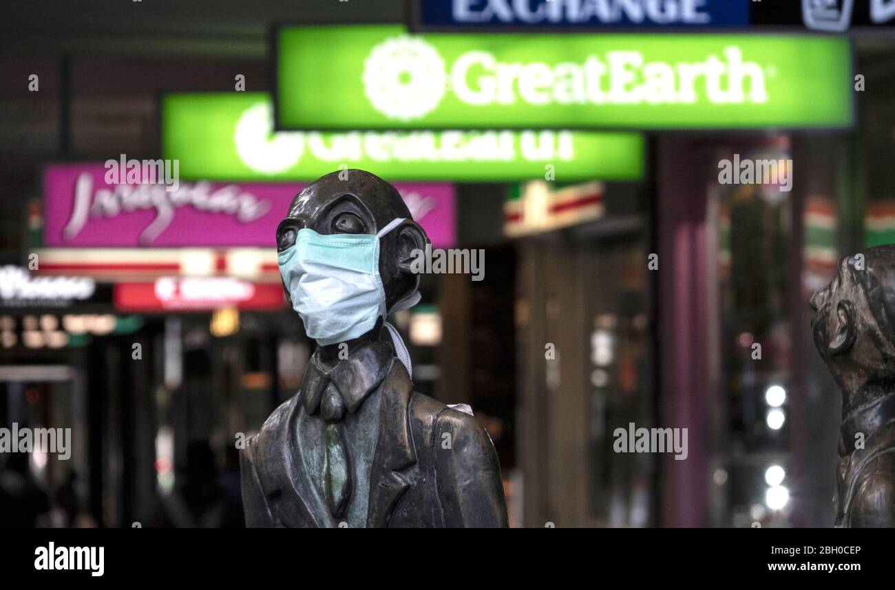 Covid-19, Coronavirus, Pandemic, Melbourne Australia 2020. A statue in the city of Melbourne wearing a face mask. Stock Photo