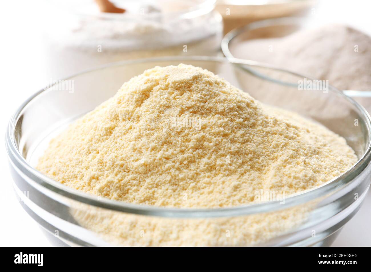 Different types of flour in bowls close up Stock Photo Alamy
