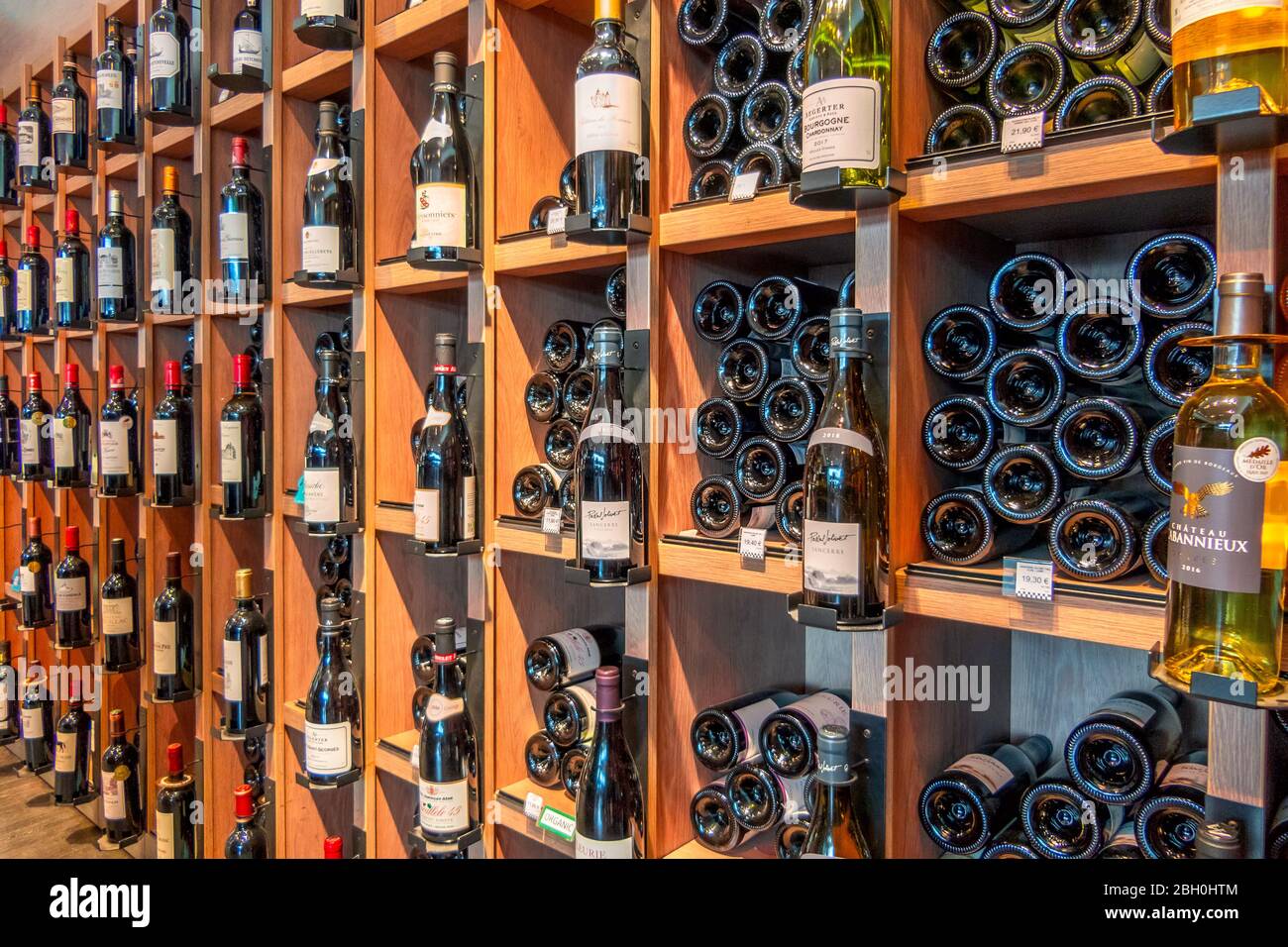 Wine shelves in french supermarket hires stock photography and images
