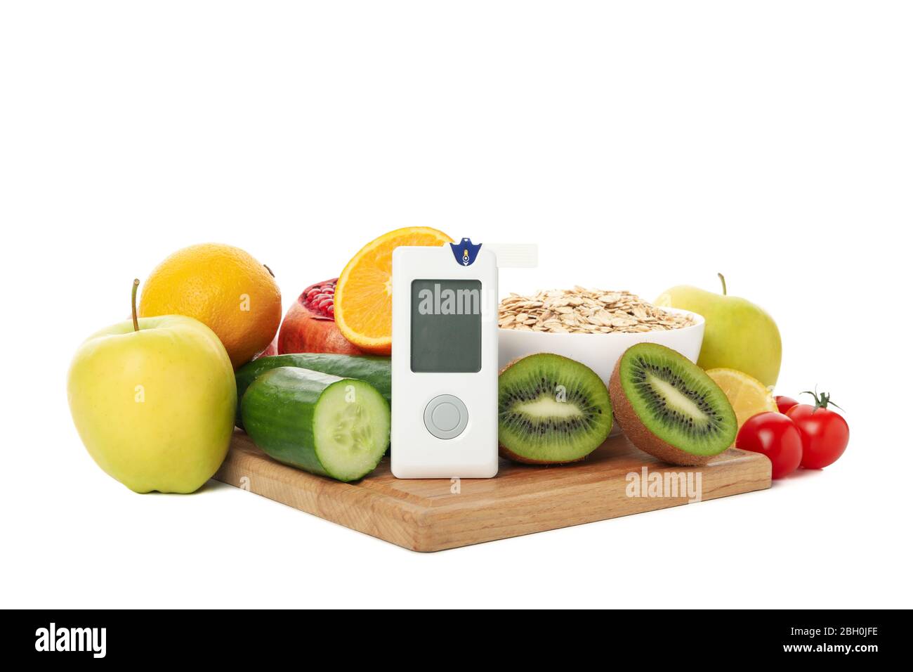 Blood glucose meter and diet food isolated on white background Stock