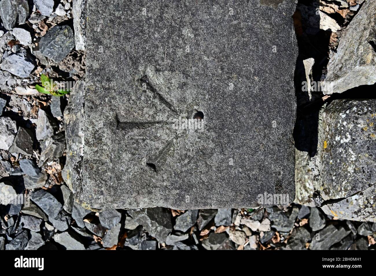 Benchmark on stone slab. Greenside, Kendal, Cumbria, England, United Kingdom, Europe. Stock Photo