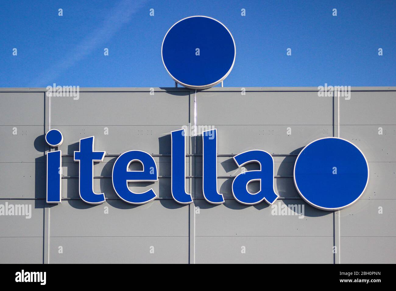 Posti Group Corporation was known as Itella in 2007–2015. This neon sign was on Itella's cargo terminal, now parcel sorting center in Lieto, Finland. Stock Photo