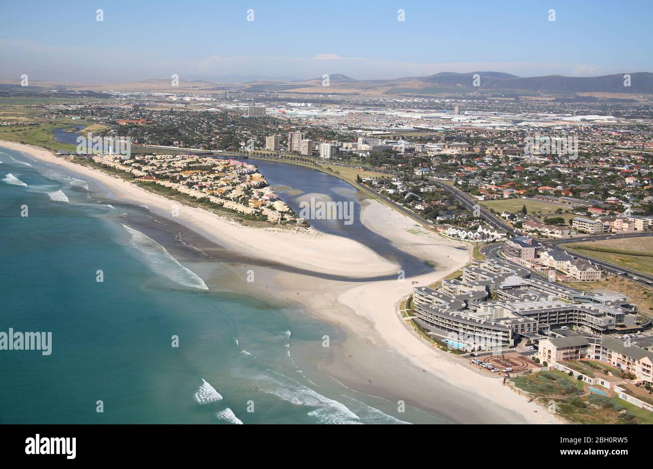 Aerial view of Milnerton Lagoon Mouth, lighthouse and Woodbridge Island Stock Photo