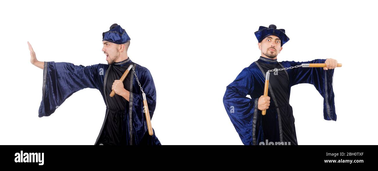 The martial arts master with nunchucks on white Stock Photo