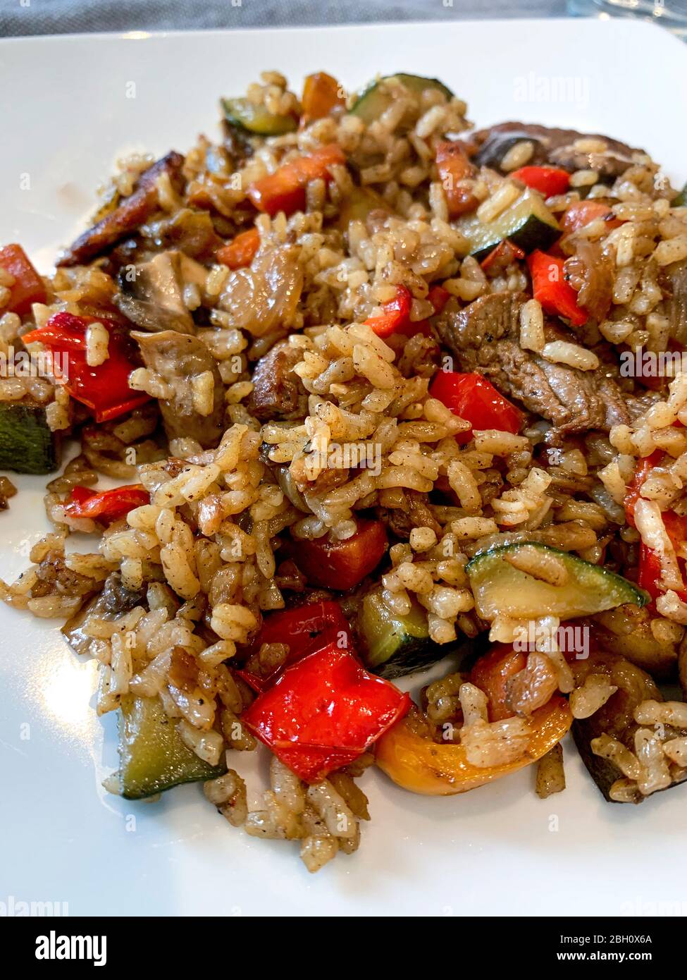 Asian style recipe with peppered beef and vegetable rice  with oyster sauce. Stock Photo