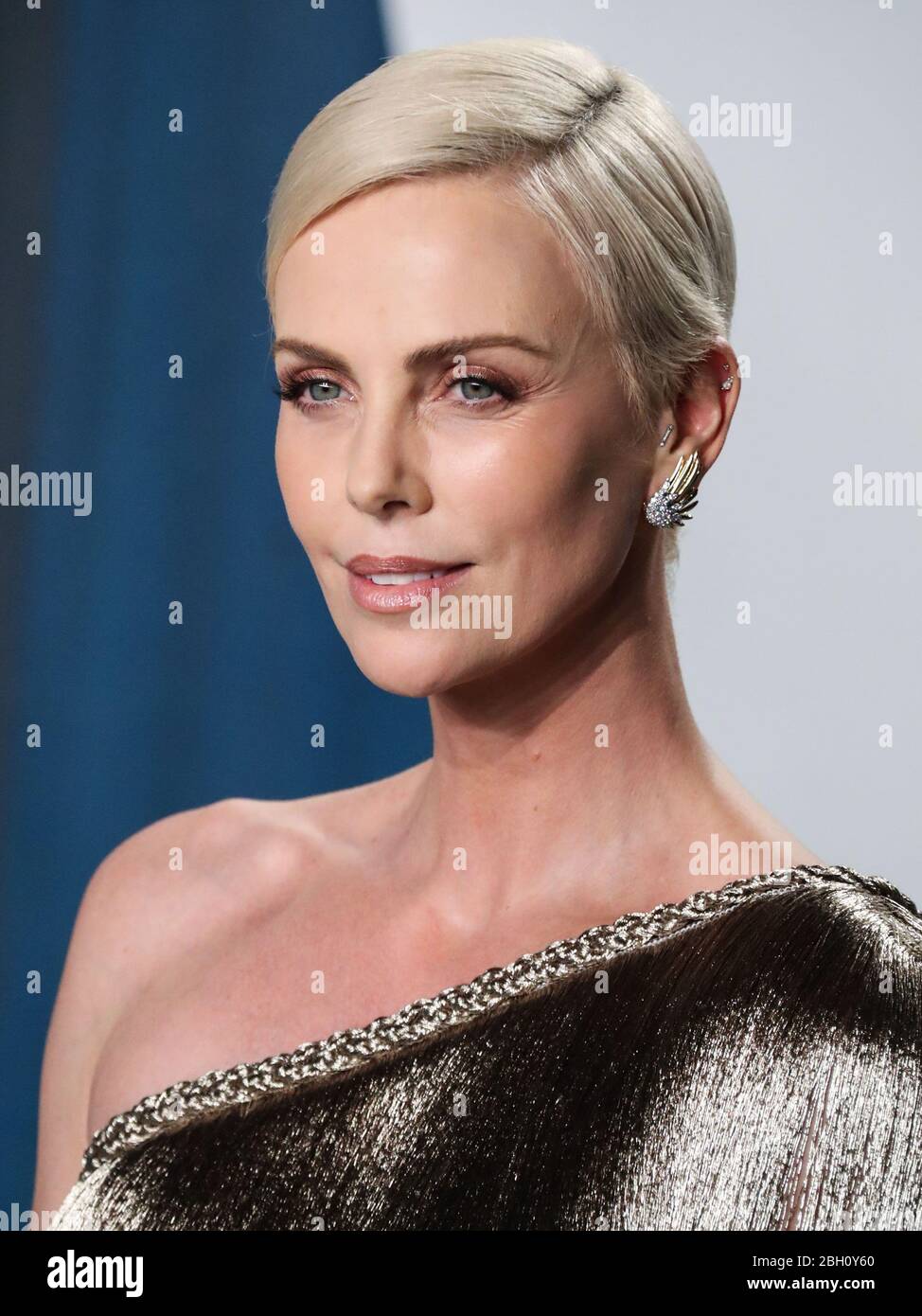(FILE) Charlize Theron Announces $1 Million Dollar Donation Amid Coronavirus COVID-19 Pandemic. Charlize Theron has donated $1 million dollars to the coronavirus relief efforts through her foundation, The Charlize Theron Africa Outreach Project and partners CARE and the Entertainment Industry Foundation (EIF). BEVERLY HILLS, LOS ANGELES, CALIFORNIA, USA - FEBRUARY 09: Actress Charlize Theron wearing Dior Haute Couture with Jimmy Choo shoes and clutch arrives at the 2020 Vanity Fair Oscar Party held at the Wallis Annenberg Center for the Performing Arts on February 9, 2020 in Beverly Hills, Los Stock Photo