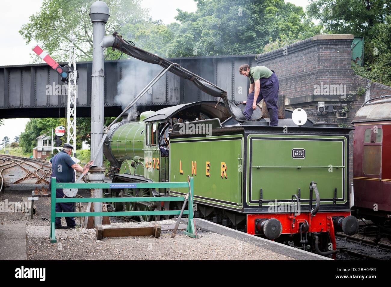 Steam Train Filling Water High Resolution Stock Photography and Images