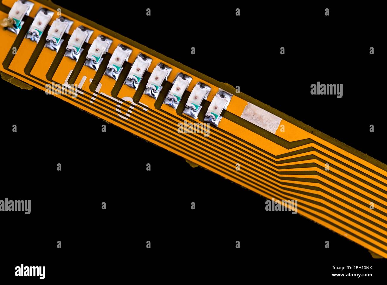 Electronic circuit board with electronic components such as chips close up. Stock Photo