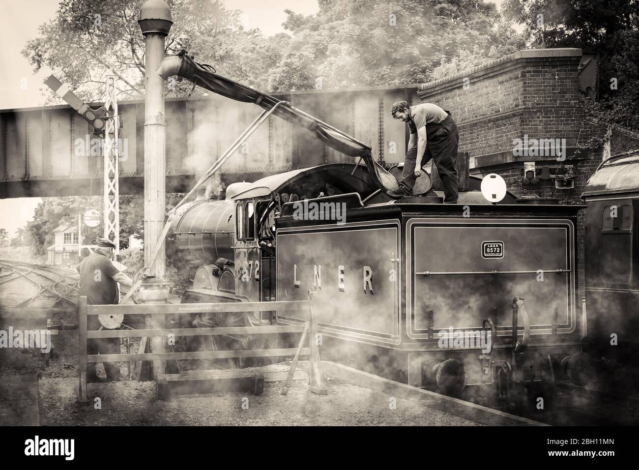 Steam Train Filling Water High Resolution Stock Photography and Images