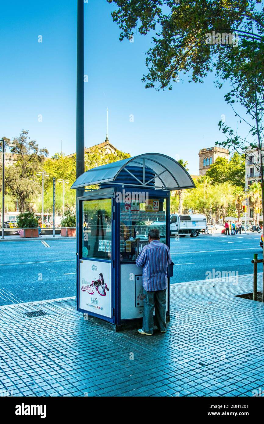 A typical Lotto kiosk in the busy centre of Barcelona, Catalonia, Spain. Stock Photo