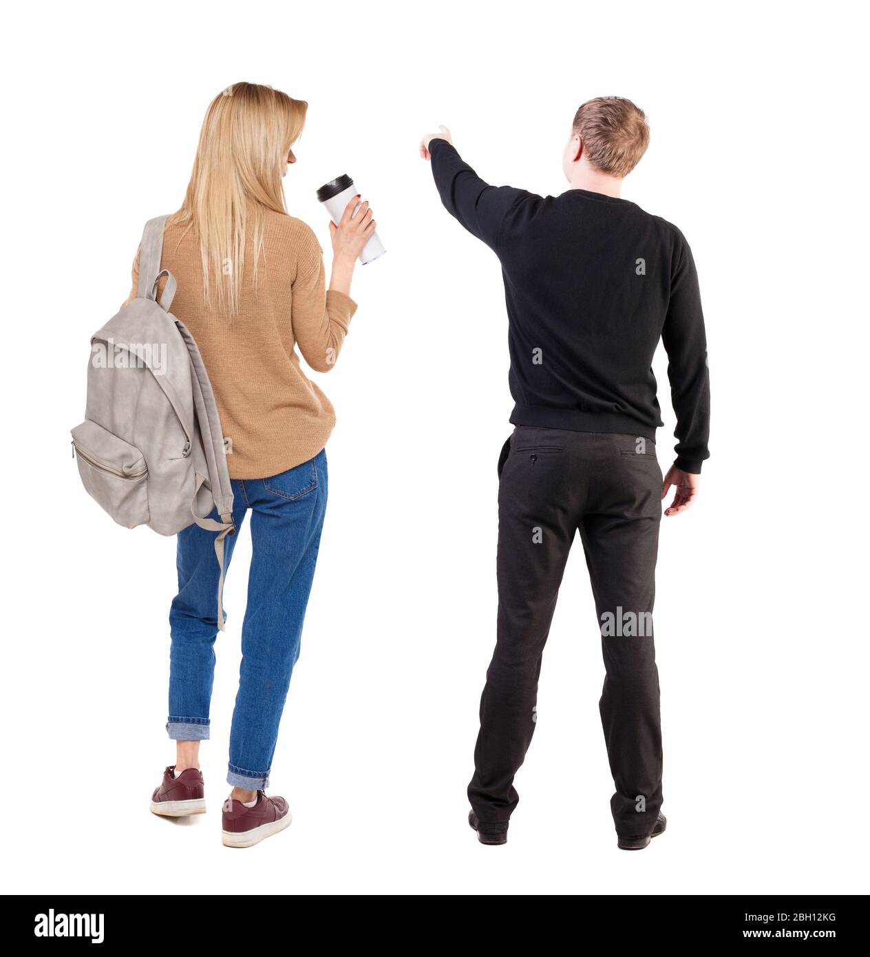 Back view of couple in sweater pointing. Rear view people collection ...