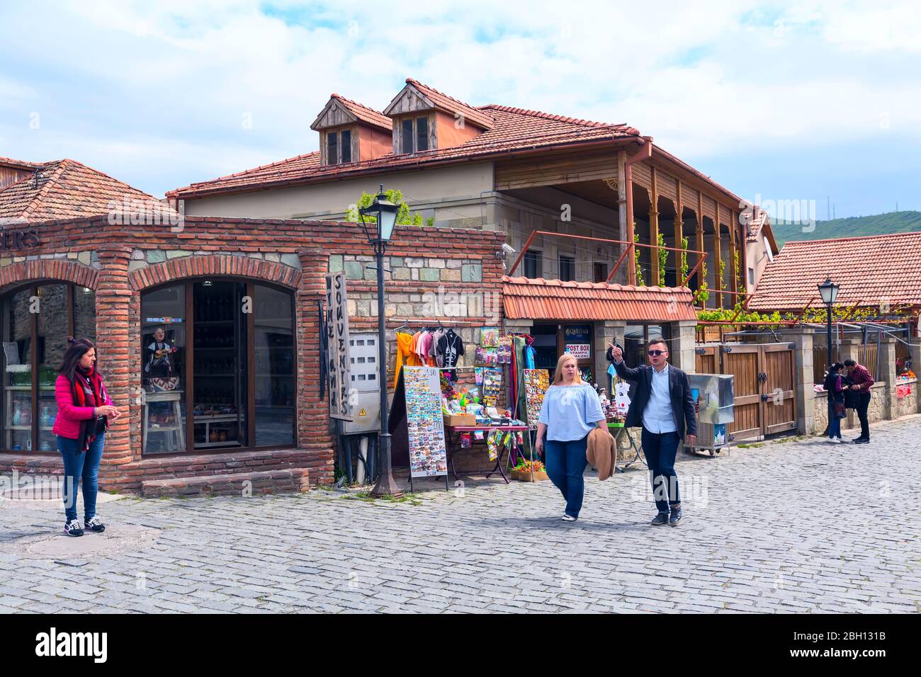 Mtskheta, Georgia - April 28, 2017: Street view with gift souvenir shops in old historical landmark town Stock Photo