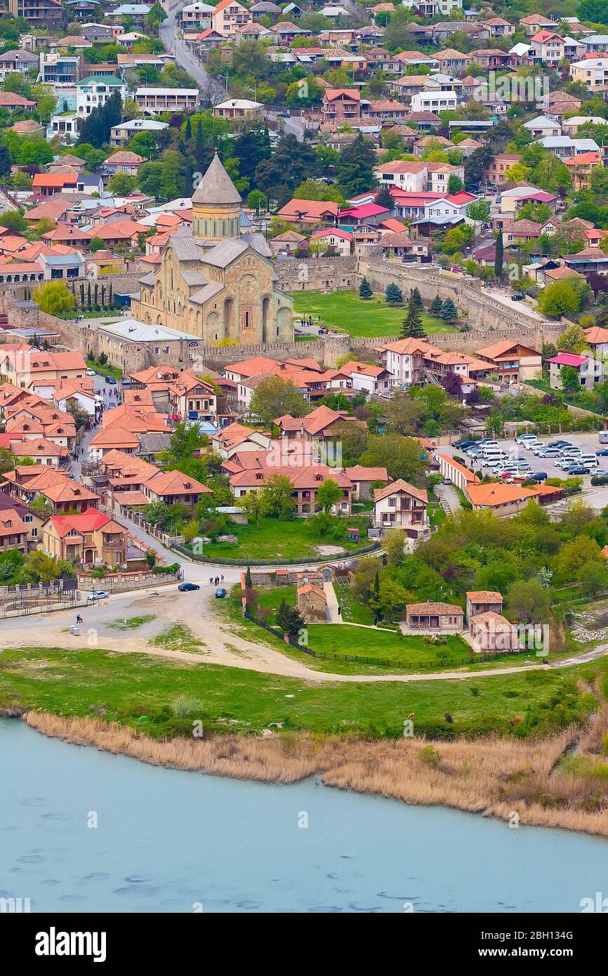 Panoramic aerial view of Mtskheta, Georgia with rivers Mtkvari or Kura and Aragvi, Svetitskhoveli Cathedral Stock Photo