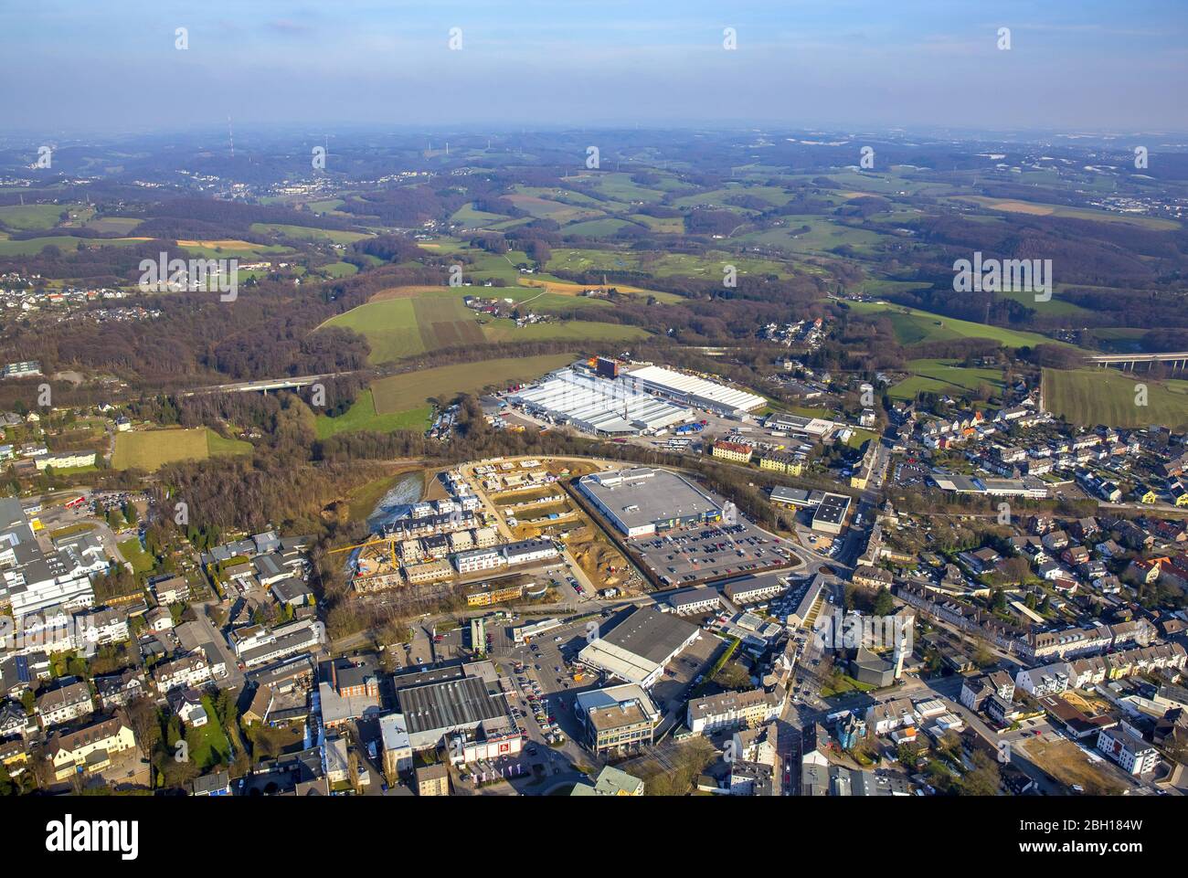 Construction site of a detached house settlement on the former grounds Woeste at the Schmale Strasse - Winkelstrasse with Edeka Hundrieser in Velbert, 09.03.2016, aerial view, Germany, North Rhine-Westphalia, Bergisches Land, Velbert Stock Photo