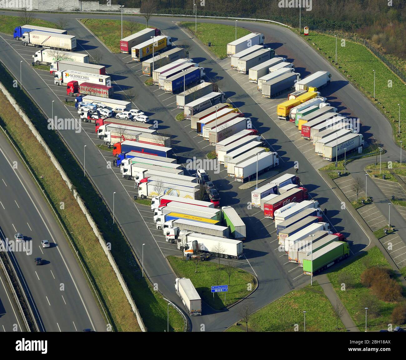 Lorries parking spaces at the highway rest stop and parking of the A2 Rasthof Resser Mark in Gelsenkirchen, 27.02.2016, aerial view, Germany, North Rhine-Westphalia, Ruhr Area, Gelsenkirchen Stock Photo