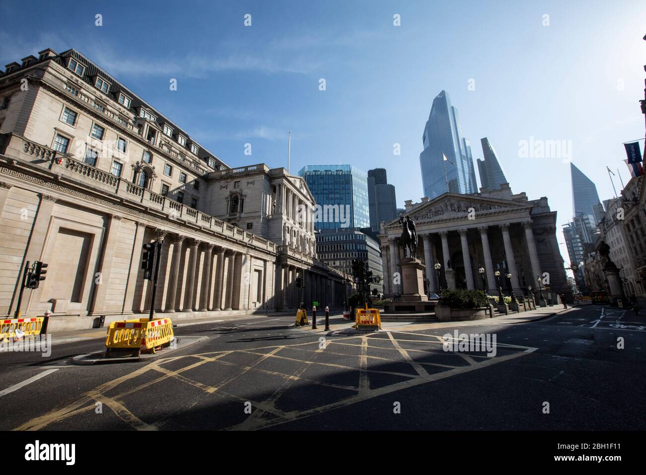 A completely abandoned Bank of England and Royal Exchange early this morning in the heart of the City of London during the coronavirus lockdown, UK Stock Photo