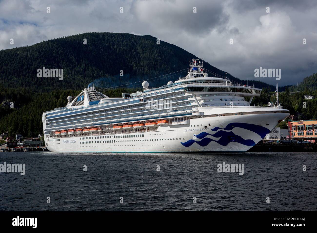 Grand Princess cruise ship moored up in a port in Alaska while on an Alaskan cruise Stock Photo