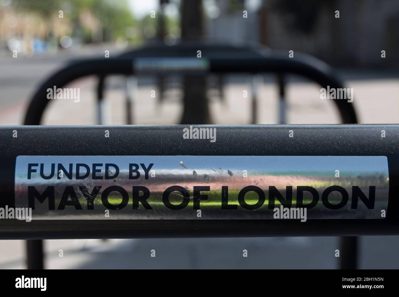 cycle parking stands in richmond, surrey, england, with label stating funded by the mayor of london Stock Photo