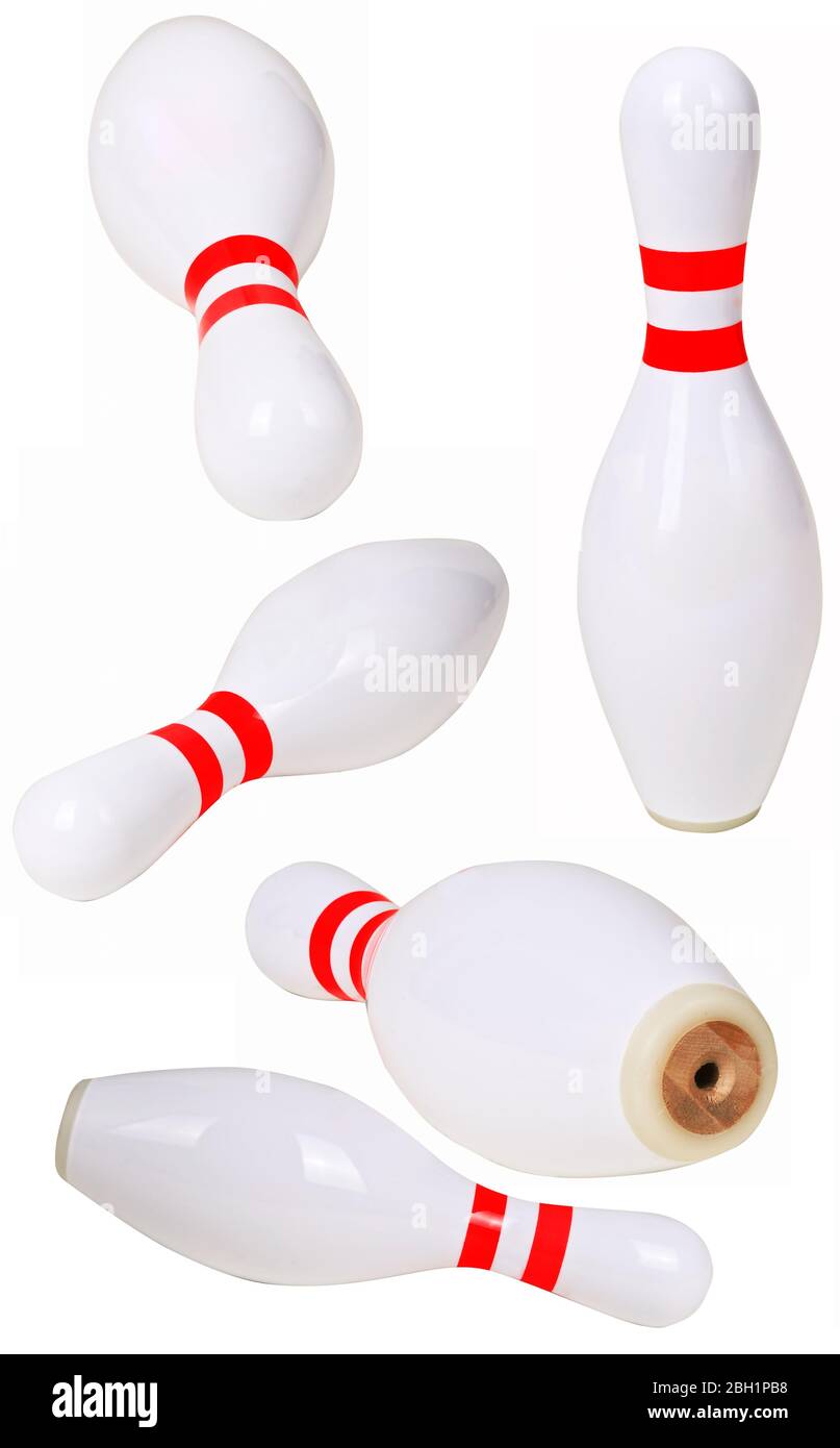 Bowling pins scattered on a white background in different angles Stock Photo