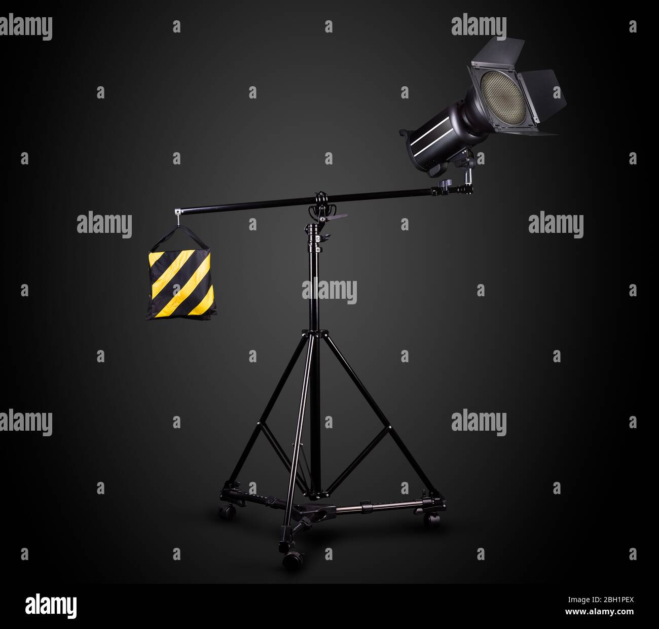 Photography studio flash on a lighting stand isolated on black background Stock Photo Alamy