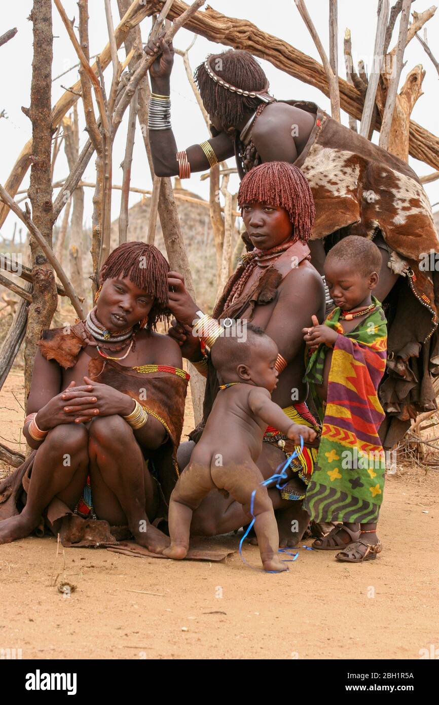 Portrait of a Hamer Tribeswoman. The hair is coated with ochre mud and animal fat. Photographed in the Omo River Valley, Ethiopia Stock Photo