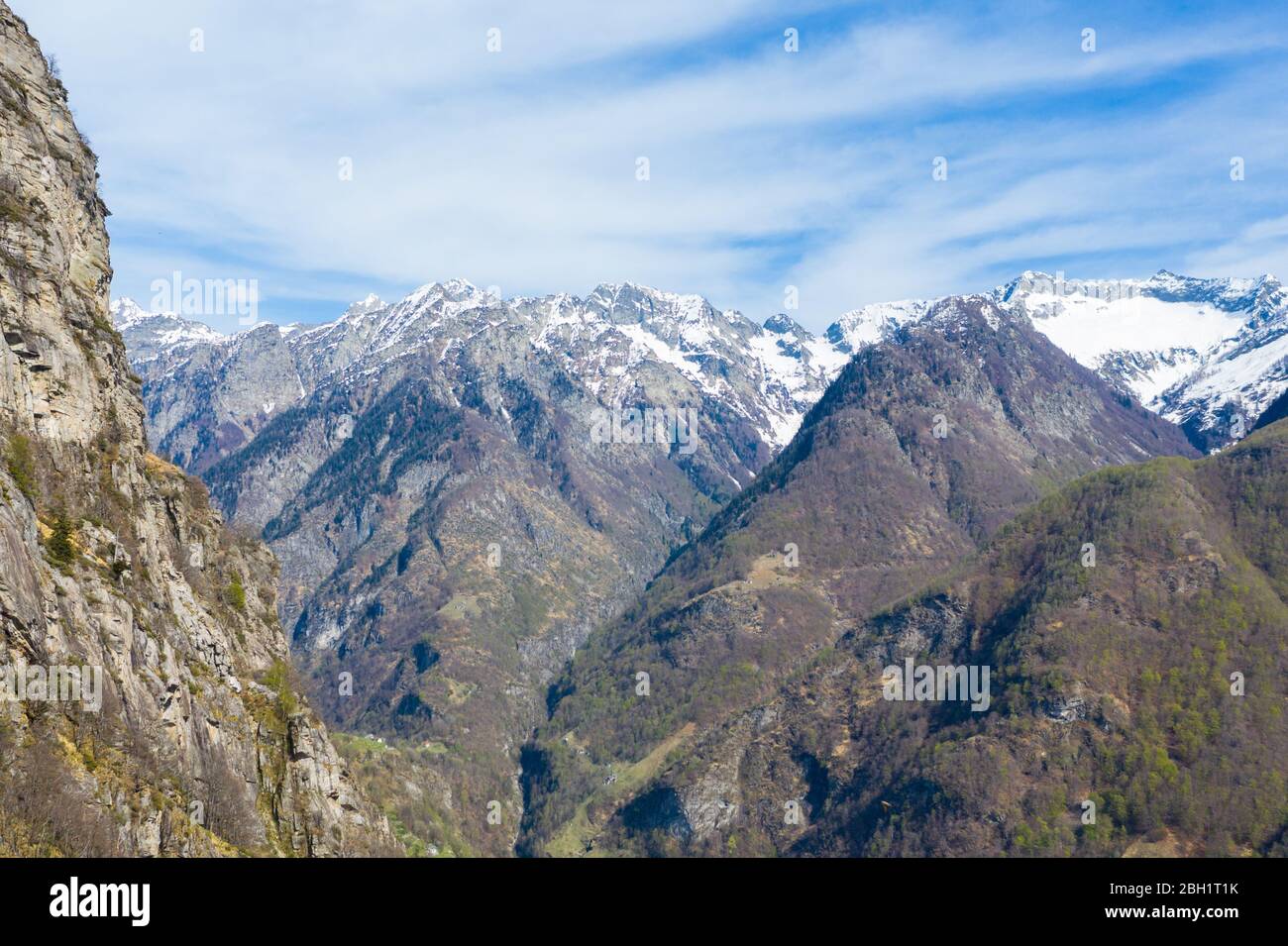 aerial mountain panorama in Ticino Lavizzara with snowcapped mountains with Monte Zucchero Stock Photo
