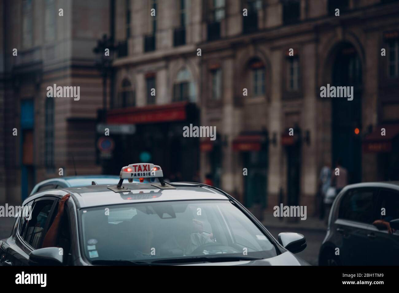 Paris taxi. Luminous sign on the roof of the car Stock Photo