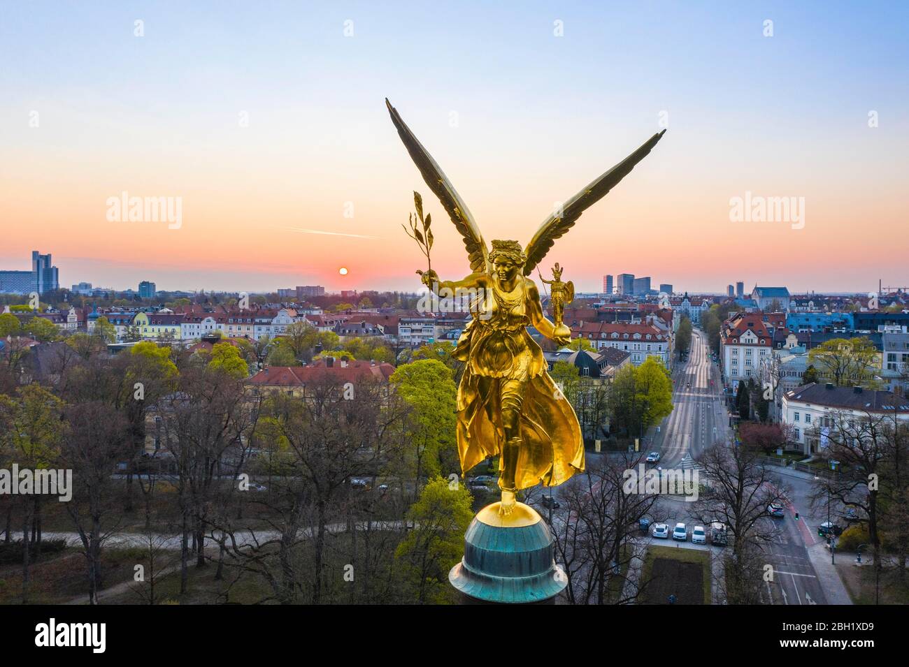 Golden Angel of Peace at sunrise, Peace Memorial, View of Prinzregentenstrasse and Bogenhausen, Drone shot, Munich, Upper Bavaria, Bavaria, Germany Stock Photo