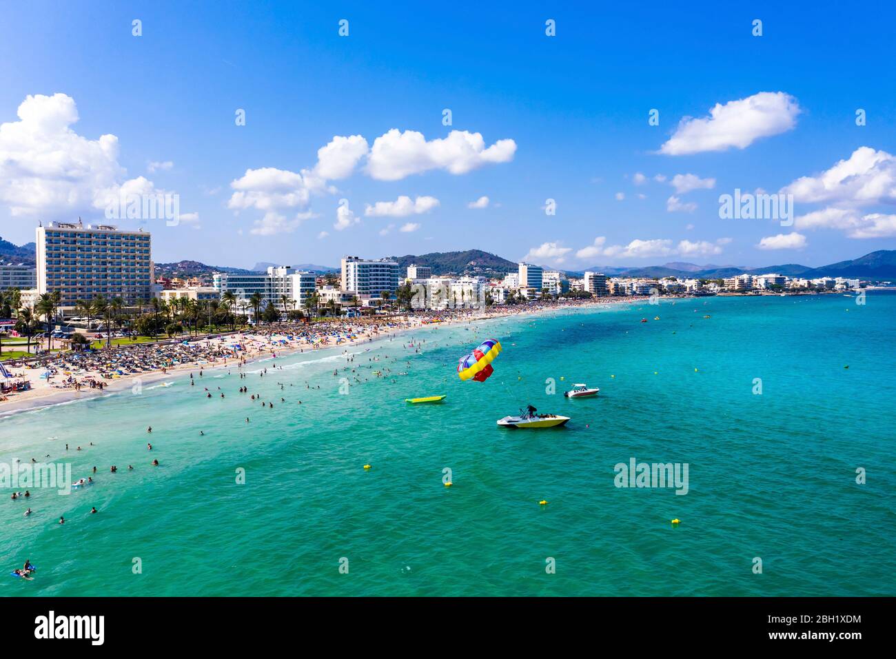 Spain, Balearic Islands, Cala Bona, Aerial view of coastline of resort town in summer Stock Photo