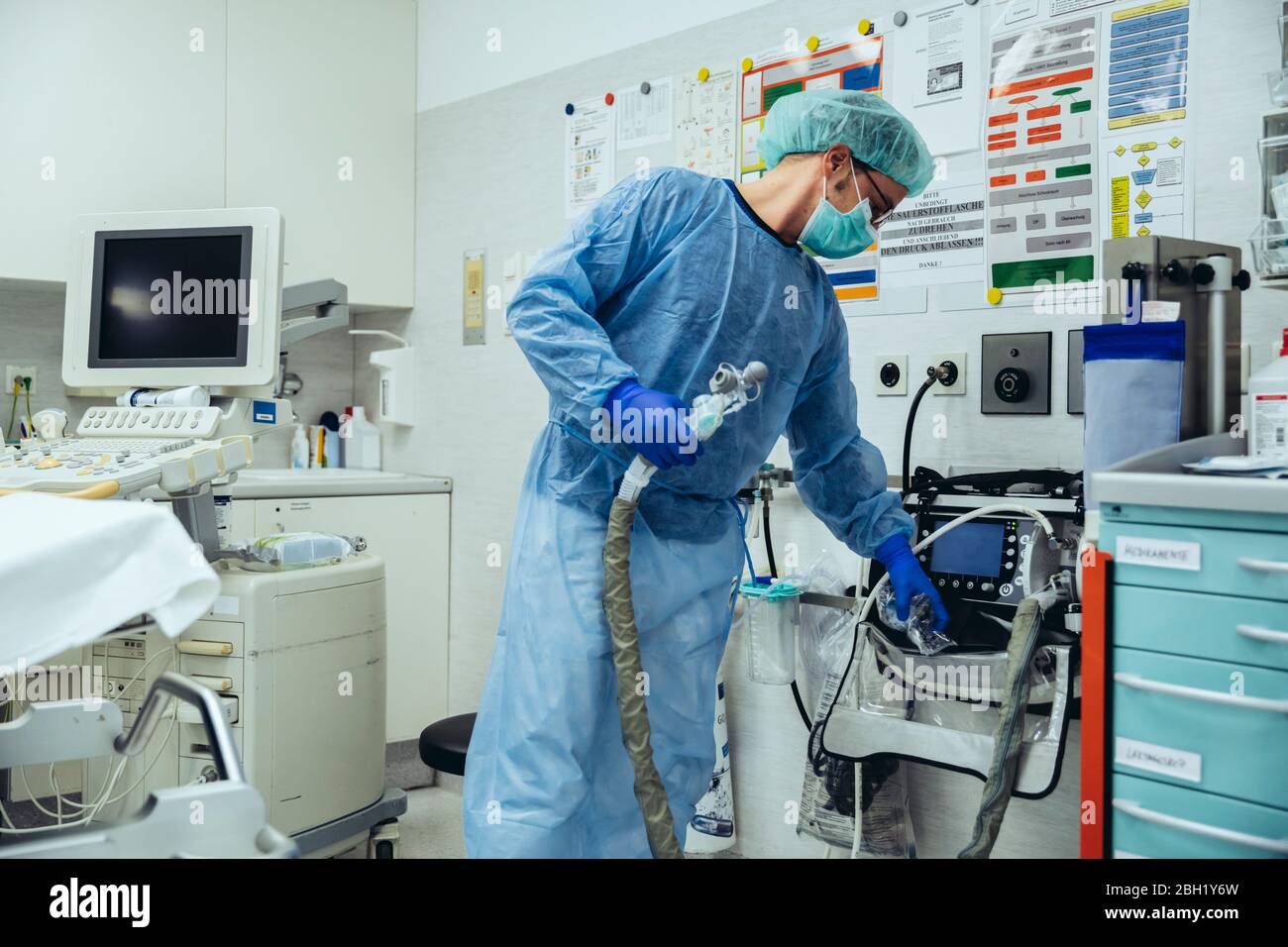 Doctor in emergency room of a hospital with respiratory equipment Stock Photo