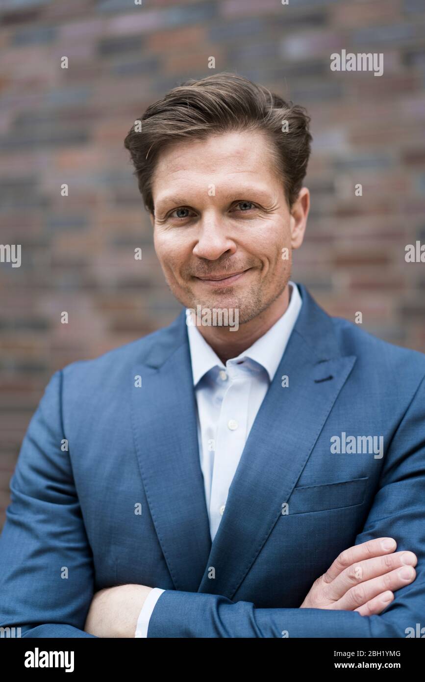 Successful smiling hi-res stock photography and images - Alamy