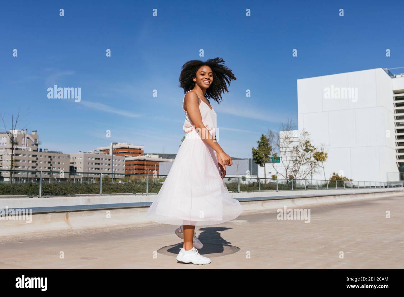 Happy joyful dancing woman hi-res stock photography and images - Alamy