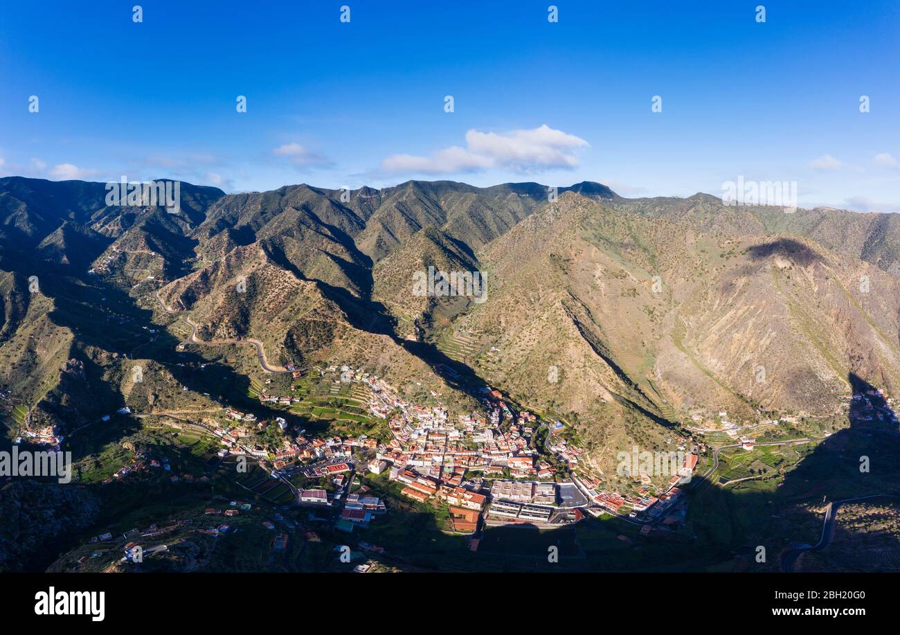 Spain, Province of Santa Cruz de Tenerife, Vallehermoso, Aerial view of town located in hilly valley of La Gomera island Stock Photo