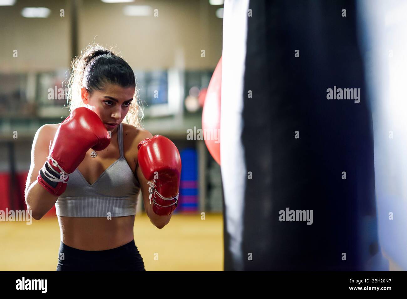 Female Boxer Punching Boxing Bag Hi Res Stock Photography And Images