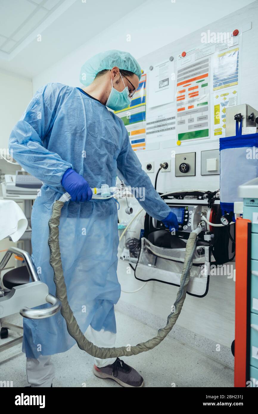 Doctor in emergency room of a hospital with respiratory equipment Stock