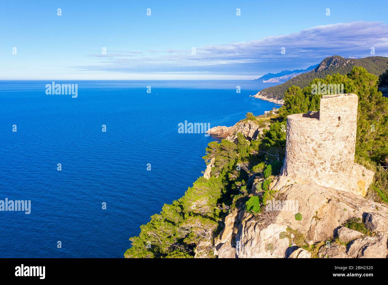 Spain, Balearic Islands, Banyalbufar, Aerial view of blue Mediterranean Sea and Torre des Verger watchtower Stock Photo