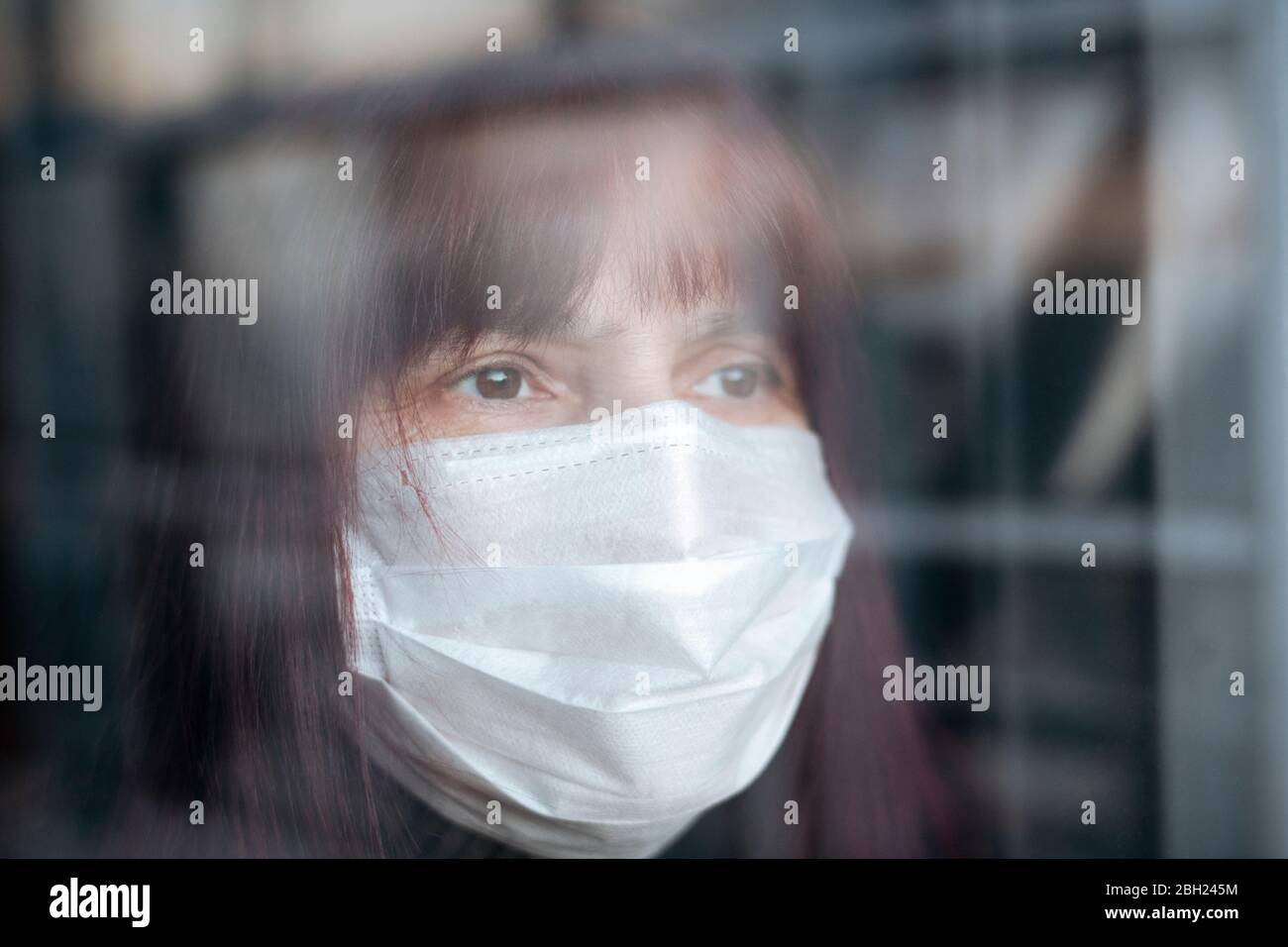 Portrait senior women wearing mask home hi-res stock photography and ...