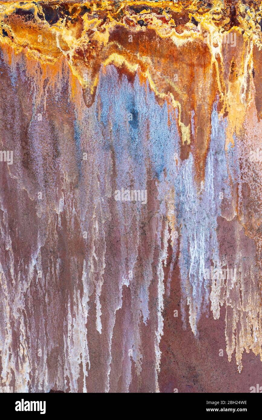 Beautiful rust pattern on the side of a metal storage tank. Corrosion caused by acidic water from Bjarnarflag Geothermal Power Station, near Krafla vo Stock Photo