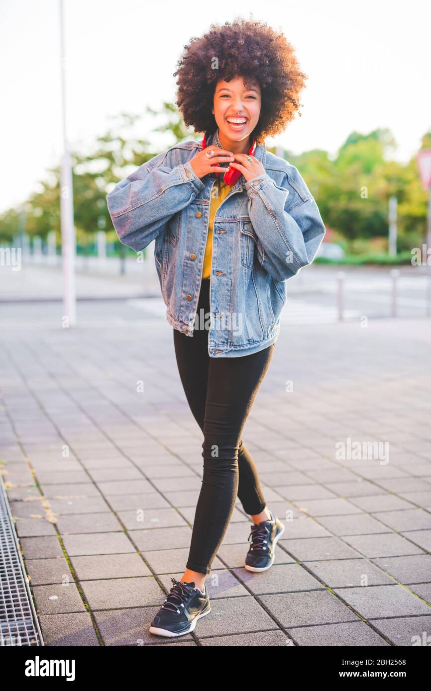 Happy cheerful young afro hi-res stock photography and images - Alamy